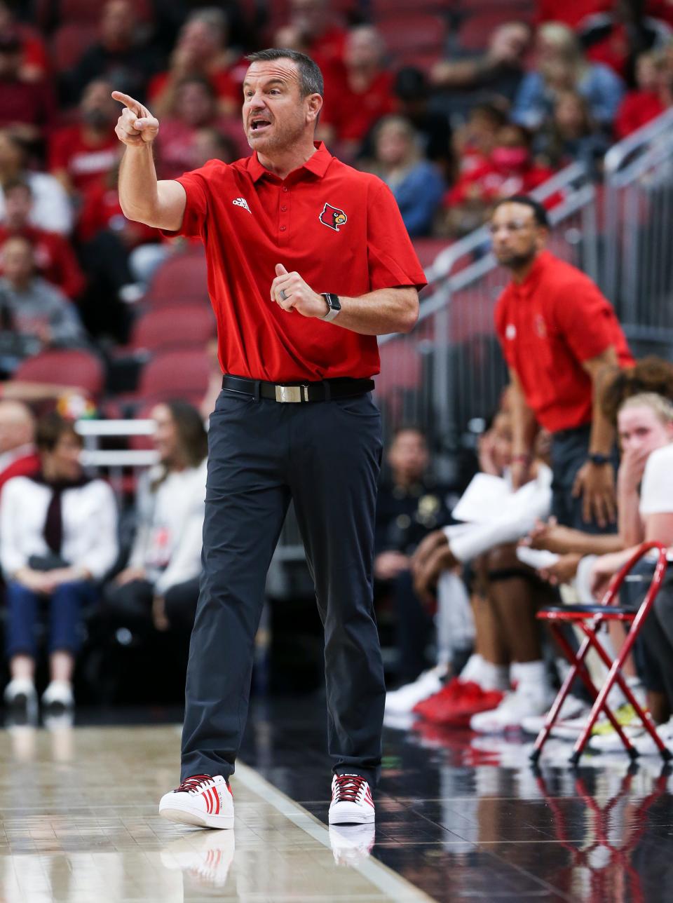 U of L head coach Jeff Walz instructed his team during their game against Cincinnati at the Yum Center in Louisville, Ky. on Nov. 7, 2022.  