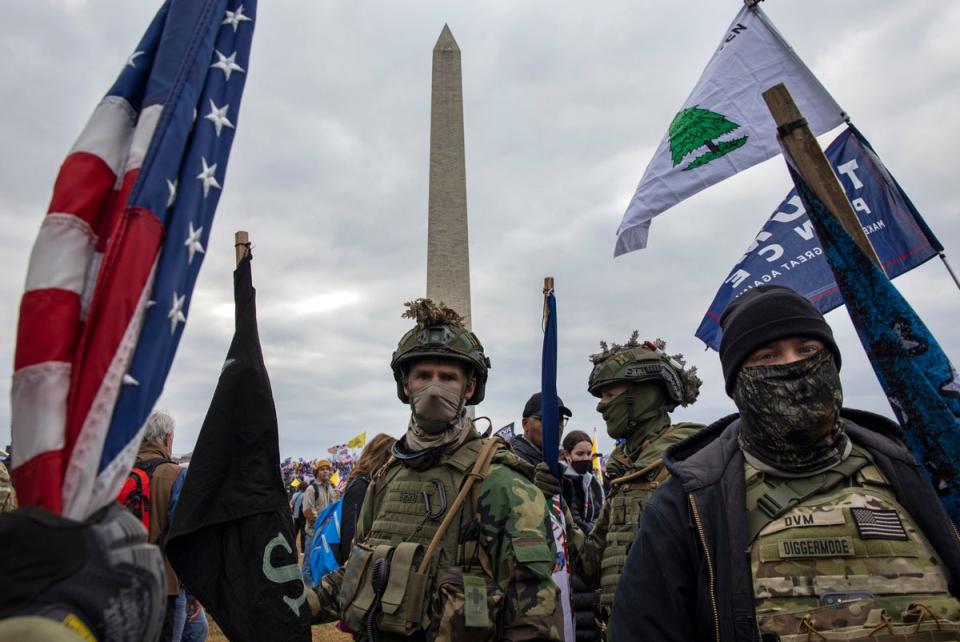 The Pine Tree flag seen outside Mr Alito’s property (top right) was displayed by some rioters at the January 6 insurrection (Getty Images)