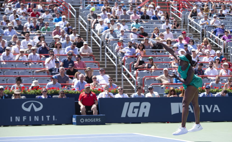 Sloane Stephens of the United States serves to Anastasija Sevastova of Latvia during quarterfinals play at the Rogers Cup tennis tournament Friday, Aug. 10, 2018 in Montreal. (Paul Chiasson/The Canadian Press via AP)