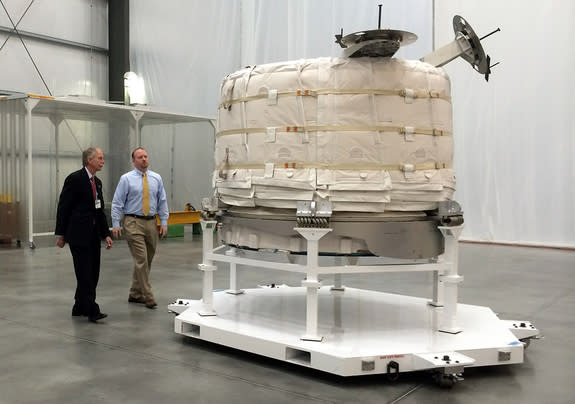 William Gerstenmaier, NASA’s associate administrator for human exploration and operations, and Jason Crusan, director of the agency's advanced exploration systems division, view the Bigelow Expandable Activity Module at Bigelow’s facility in La