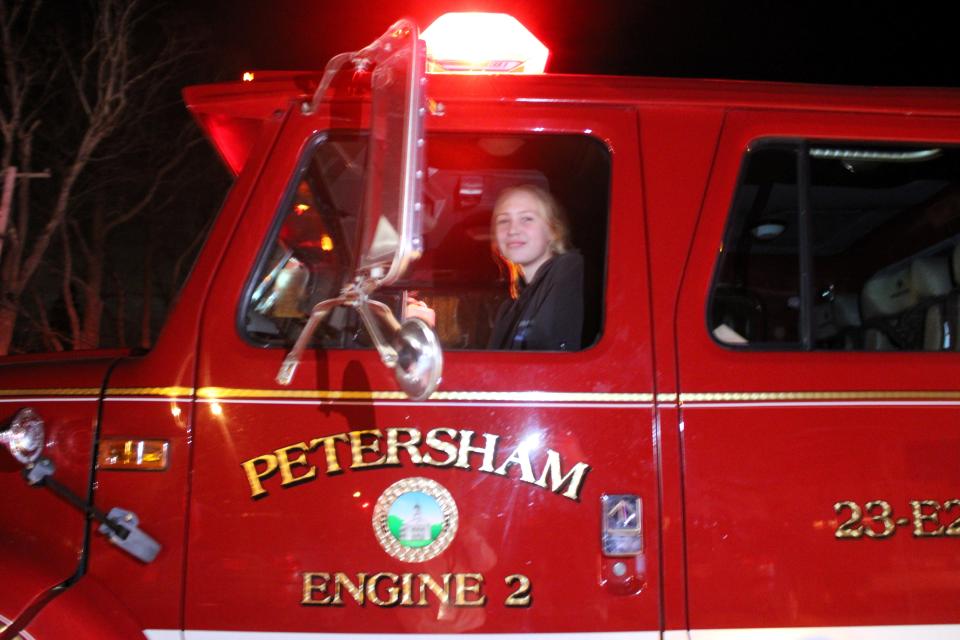 Hannah Baxter takes the fire truck for a drive for the first time. She previously served as a junior firefighter but since turning 18 has upgraded to volunteer status.