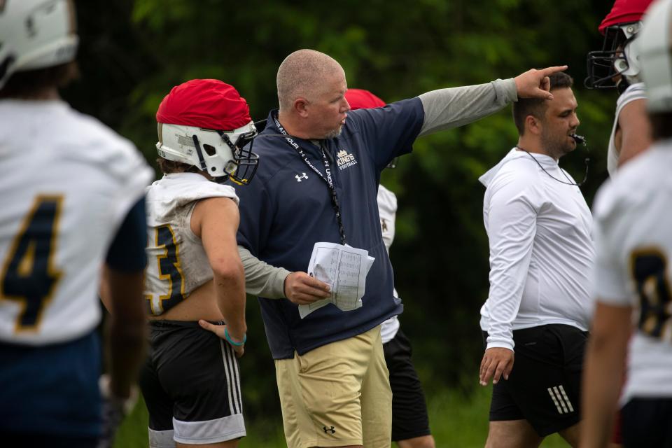 SFCA coach Bill Moore works with his players at practice on Wednesday, Aug. 4, 2021, in Fort Myers.