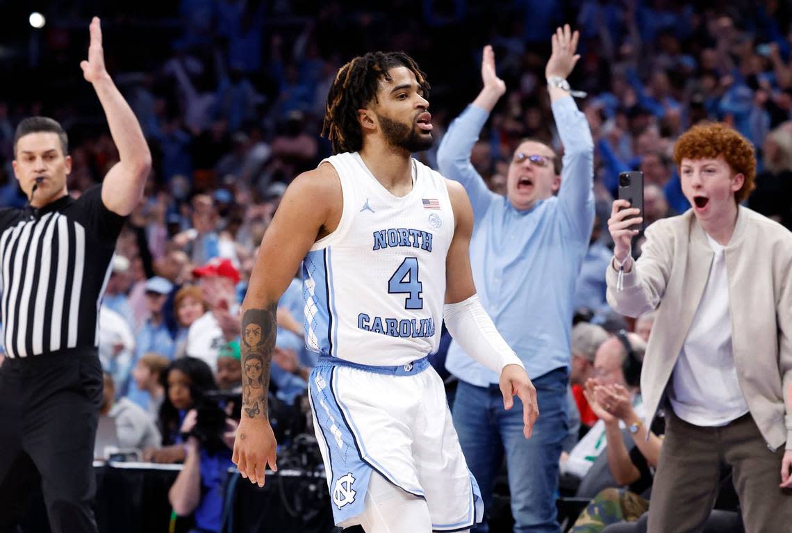 North Carolina’s RJ Davis (4) celebrates making a three-pointer during the first half of N.C. State’s game against UNC in the championship game of the 2024 ACC Men’s Basketball Tournament at Capital One Arena in Washington, D.C., Saturday, March 16, 2024.