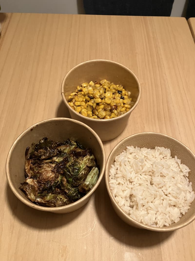 Corn, brussel sprouts, and rice in jars.