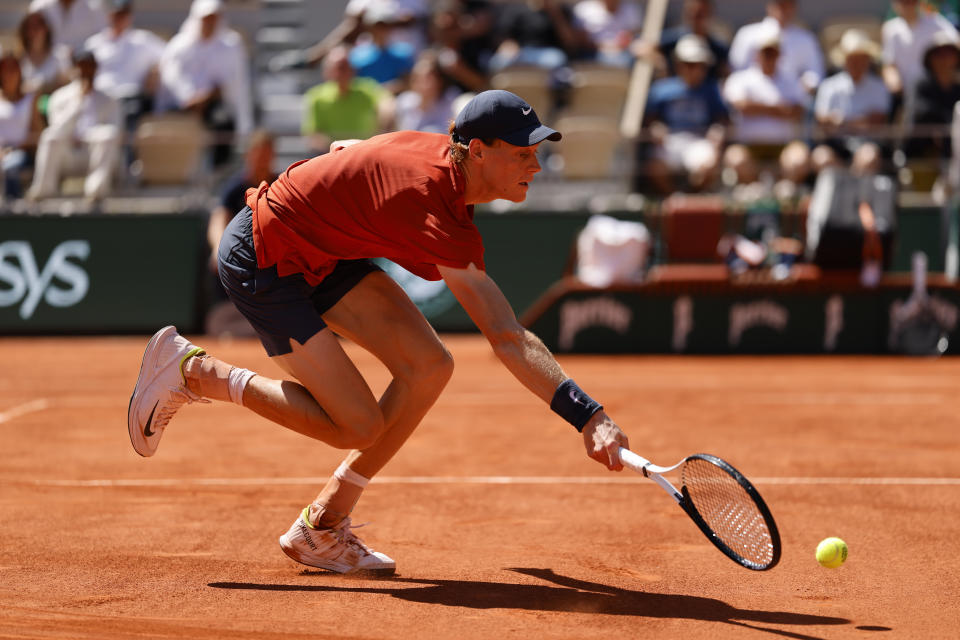 Italy's Jannik Sinner plays a shot against Spain's Carlos Alcaraz during their semifinal match of the French Open tennis tournament at the Roland Garros stadium in Paris, Friday, June 7, 2024. (AP Photo/Jean-Francois Badias)