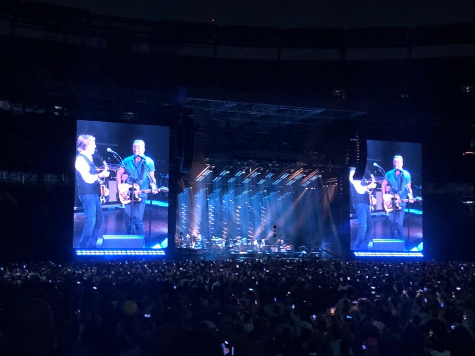 Bruce Springsteen joins Paul McCartney on stage Thursday, June 16, at MetLife Stadium in East Rutherford.