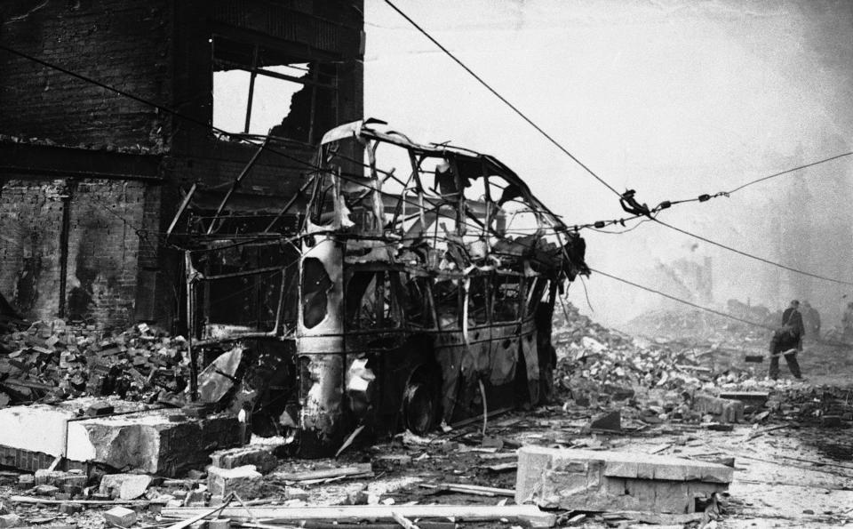 The remains of a bomb wrecked trolley bus, a victim of the Luftwaffe’s large scale dive bombing attack in Coventry, England on Nov. 14, 1940.  (AP Photo)