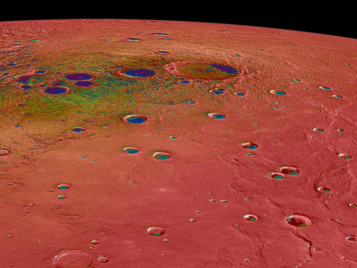 <p>The scorched planet has vast amounts of ice sitting at its poles – despite the surface reaching temperatures of 430C</p> (Nasa)