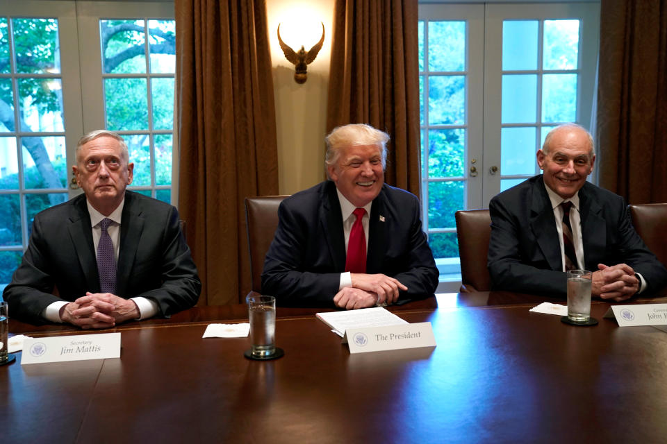 President Donald Trump, flanked at a White House meeting on Oct. 5, 2017, by Defense Secretary James Mattis and White House Chief of Staff John Kelly. (Photo: Yuri Gripas / Reuters)
