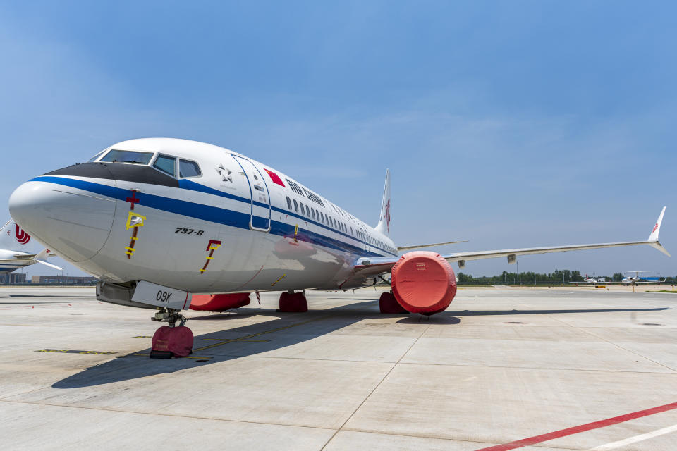 A Boeing 737 Max jet plane of Air China is parked at the Beijing Capital International Airport in Beijing, China, 4 July 2019. Boeing said it will provide $100 million over several years to help families and communities affected by two crashes of its 737 Max plane that killed 346 people. (Photo by Chen chen - Imaginechina/Sipa USA)