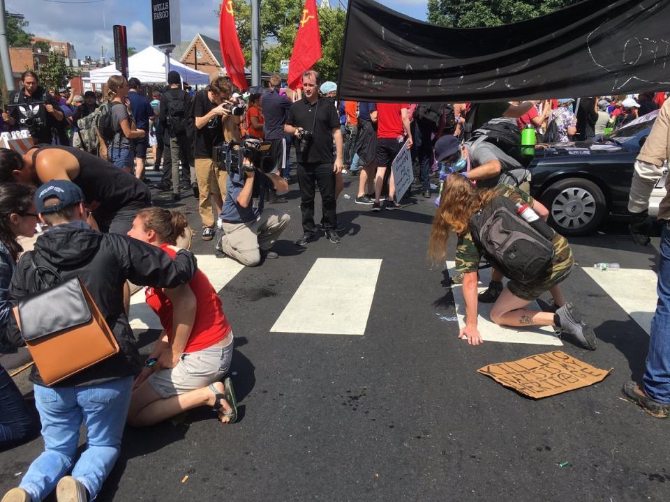 Protesters and counter-protesters after being pepper-sprayed and/or maced.