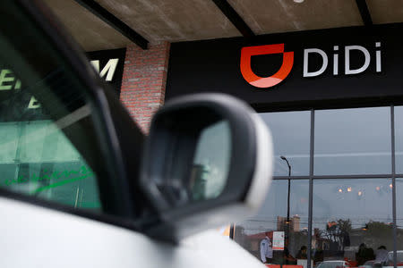The logo of Chinese ride-hailing firm Didi Chuxing is seen at their new drivers center in Toluca, Mexico, April 23, 2018. REUTERS/Carlos Jasso