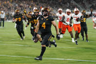 Arizona State running back Cameron Skattebo (4) beats the Oklahoma State defense for a touchdown during the first half of an NCAA college football game Saturday, Sept. 9, 2023, in Tempe, Ariz. (AP Photo/Ross D. Franklin)