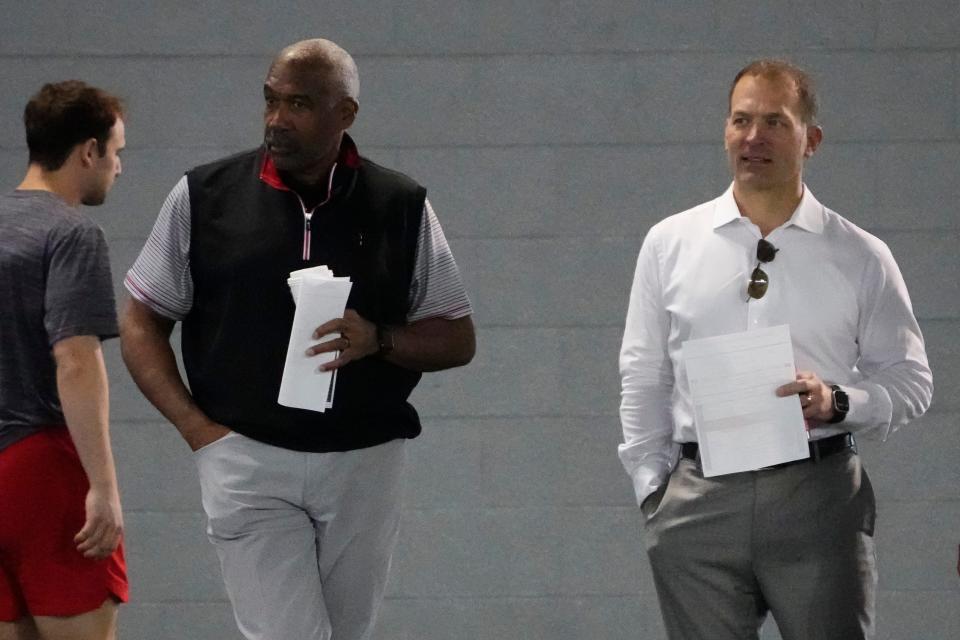 Ohio State athletic director Gene Smith stands beside his replacement, Ross Bjork.