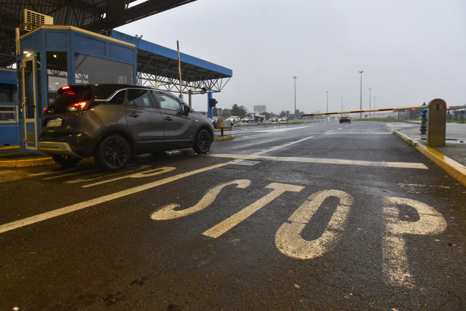 A car crosses the border between Croatia and Slovenia at the Bregana border crossing, Thursday, Dec. 8, 2022. European Union countries are weighing on Thursday whether the bloc’s three newest members — Bulgaria, Romania, and Croatia — can fully open their borders and participate in Europe’s ID-check-free travel zone, but more delays to their entry appear likely. (AP Photo)