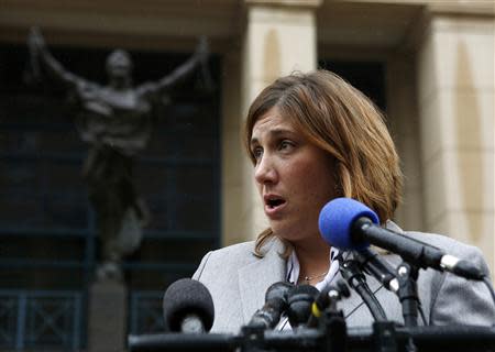 Marla Diaz, attorney for the Baltimore Museum of Art, speaks to the media outside of the U.S. District Court in Alexandria, Virginia January 10, 2014. REUTERS/Gary Cameron