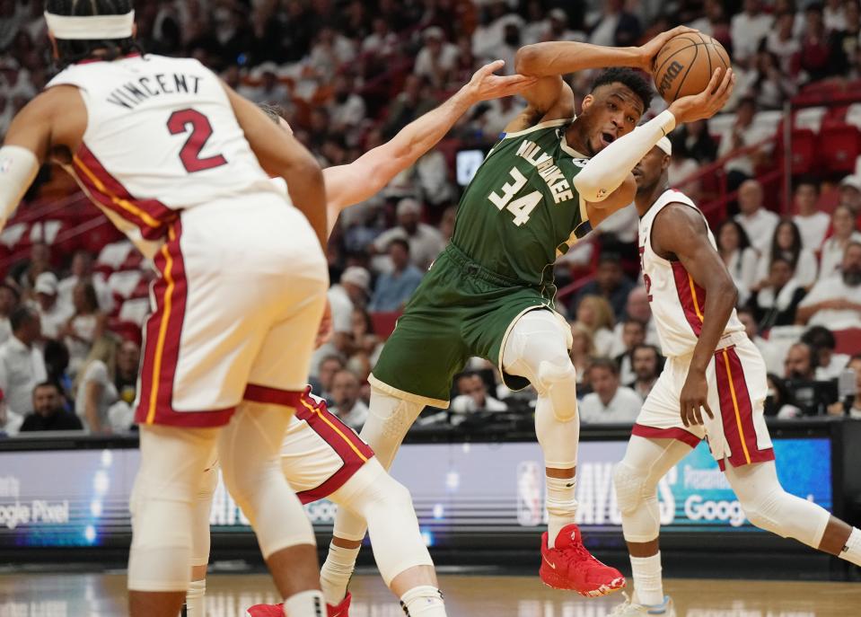 Bucks forward Giannis Antetokounmpo (34) drives to the basket against the Heat during the first quarter of Game 4 of their first-round playoff series Monday night in Miami.