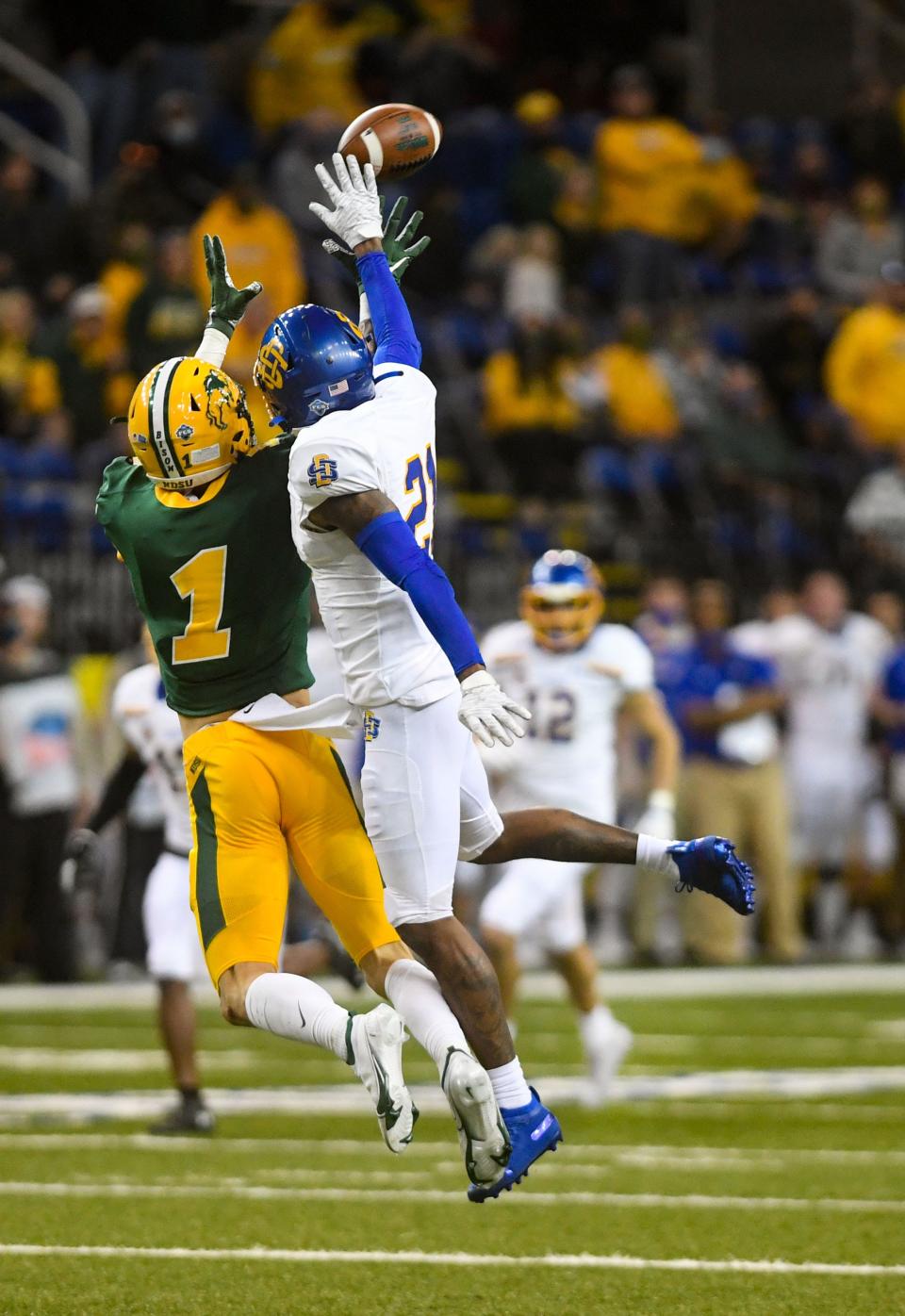 South Dakota State's Don Gardner knocks away a pass intended for North Dakota State's Christian Watson in the Dakota Marker rivalry game on Saturday, April 17, 2021, at the Fargodome in Fargo. 