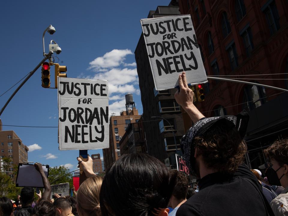 Black Lives Matter protestors march through the streets to demand justice for Jordan Neely.