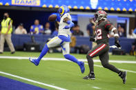 Los Angeles Rams wide receiver DeSean Jackson left, scores a touchdown past Tampa Bay Buccaneers safety Mike Edwards during the second half of an NFL football game against the Tampa Bay Buccaneers Sunday, Sept. 26, 2021, in Inglewood, Calif. (AP Photo/Jae C. Hong)