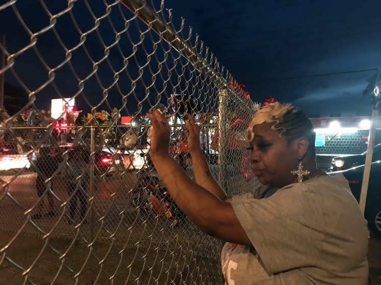 Addie McAtte, 50, stands at the site where her brother, David McAtte, 53, was shot and killed by Louisville police June 1.