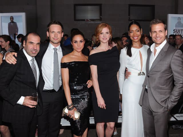 <p>Jamie McCarthy/Getty</p> Rick Hoffman, Patrick J. Adams, Meghan Markle, Sarah Rafferty, Gina Torres and Gabriel Macht of Suits attend USA Network and Mr Porter.com Present "A Suits Story" in 2012
