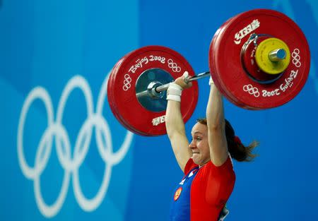 Marina Shainova of Russia competes in the women's 58kg Group A weightlifting competition at the Beijing 2008 Olympic Games August 11, 2008. REUTERS/Oleg Popov