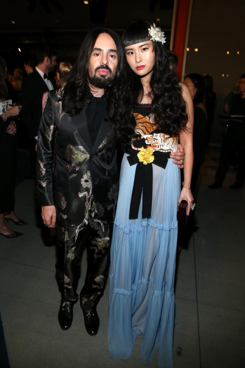 Gucci Creative Director Alessandro Michele (L) and musician Asia Chow, wearing Gucci, attend LACMA's 2015 Art+Film Gala Honoring James Turrell and Alejandro G IÃ±Ã¡rritu, presented by Gucci at LACMA on 7 November 2015 in Los Angeles.  California (fake images)