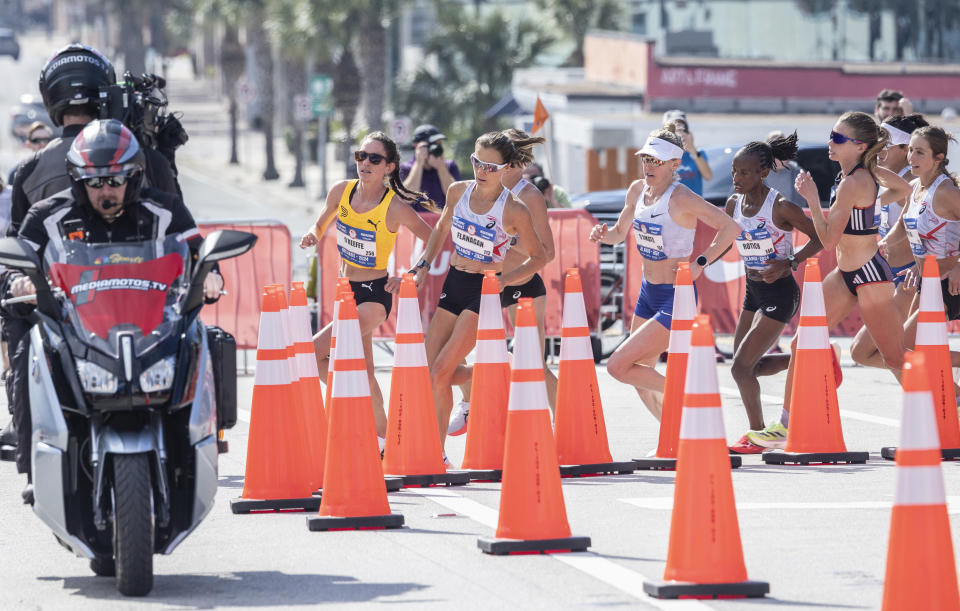 Competitors run during the U.S. Olympic marathon trials in Orlando, Fla., Saturday, Feb. 3, 2024. (Willie J. Allen Jr./Orlando Sentinel via AP)