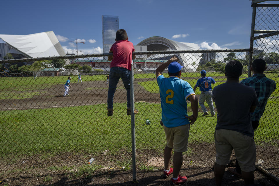 Nicaraguans hold a baseball tournament ahead of the regular season at Sabana Park in San Jose, Costa Rica, Sunday, Aug. 28, 2022. The number of players for the local league in Costa Rica has increased since Nicaraguans began seeking asylum at the highest levels since their country['s political crisis exploded in April 2018. (AP Photo/Moises Castillo)