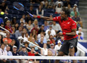 Gael Monfils, of France, returns a shot near the net to Denis Shapovalov, of Canada, during the third round of the U.S. Open tennis tournament Saturday, Aug. 31, 2019, in New York. (AP Photo/Jason DeCrow)