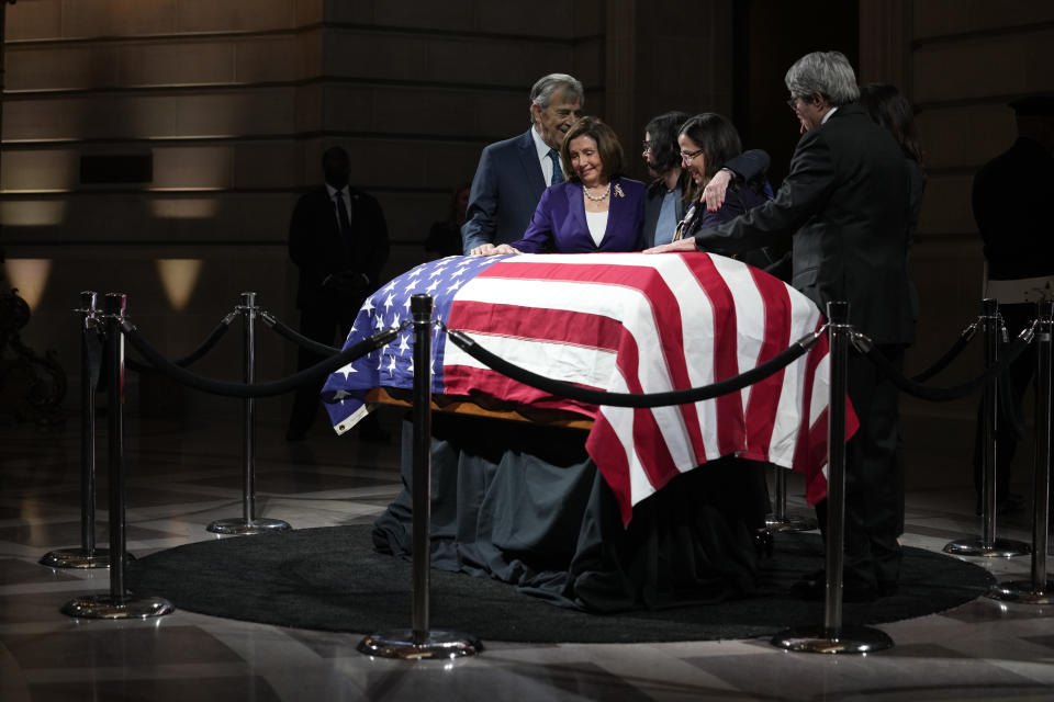 Rep. Nancy Pelosi, D-Calif. second from left, surrounded by her family, places her hands over the casket of Sen. Dianne Feinstein at City Hall on Wednesday, Oct. 4, 2023, in San Francisco. Feinstein's casket was displayed in the rotunda at City Hall. Feinstein, who died Sept. 29, served as San Francisco mayor. (AP Photo/Godofredo A. Vásquez)