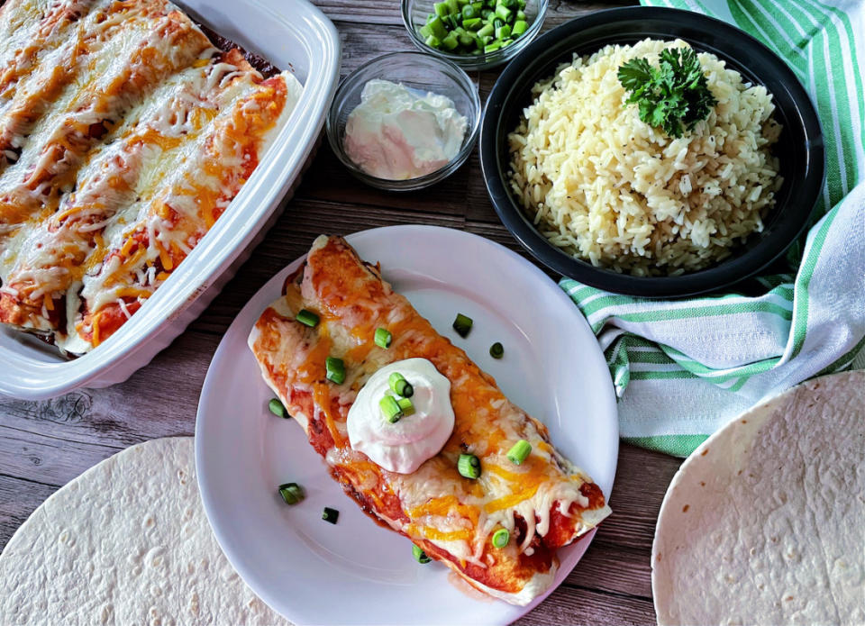 <p>Krista Marshall</p><p>This easy beef enchilada recipe has a short ingredient list and can be on the table in under one hour.</p><p><strong>Get the recipe: <a href="/842588/kristamarshall/easy-beef-enchiladas/" data-ylk="slk:Easy Beef Enchiladas;elm:context_link;itc:0;sec:content-canvas" class="link ">Easy Beef Enchiladas</a></strong></p>