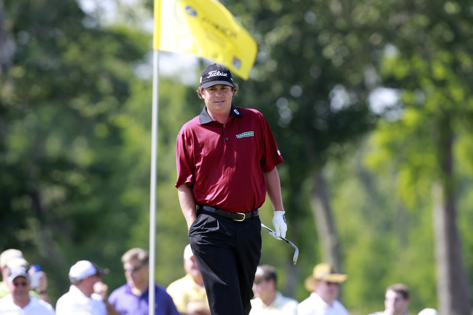 Jason Dufner walks to the pin during the second round of the Zurich Classic golf tournament at TPC Louisiana in Avondale, La., Friday, April 27, 2012. (AP Photo/Gerald Herbert)