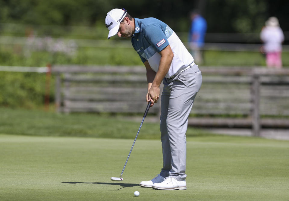 Germany's Nicolai von Dellingshausen putts during the German International Open golf tournament at Golfclub Muenchen Eichenried in Munich, Germany, Thursday, June 23, 2022. (Christian Kolbert/dpa via AP)