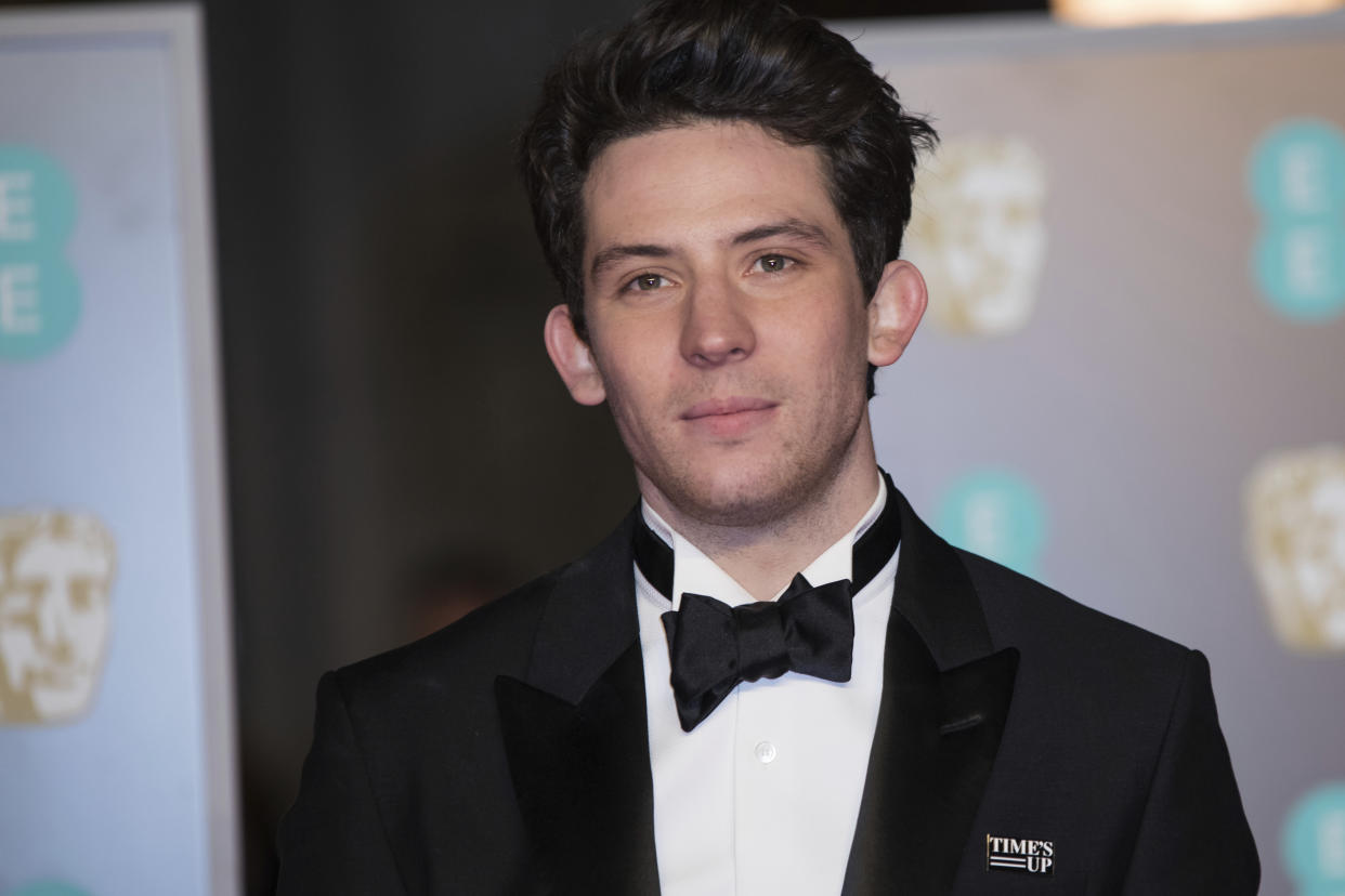 Josh O'Connor poses for photographers upon arrival at the BAFTA Awards 2018 in London, Sunday, Feb. 18, 2018. (Photo by Vianney Le Caer/Invision/AP)