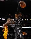 MIAMI, FL - JANUARY 19: LeBron James #6 of the Miami Heat grabs a rebound as Joel Anthony #50 gets caught up with Andrew Bynum #17 of the Los Angeles Lakers during a game at American Airlines Arena on January 19, 2012 in Miami, Florida. NOTE TO USER: User expressly acknowledges and agrees that, by downloading and/or using this Photograph, User is consenting to the terms and conditions of the Getty Images License Agreement. (Photo by Mike Ehrmann/Getty Images)