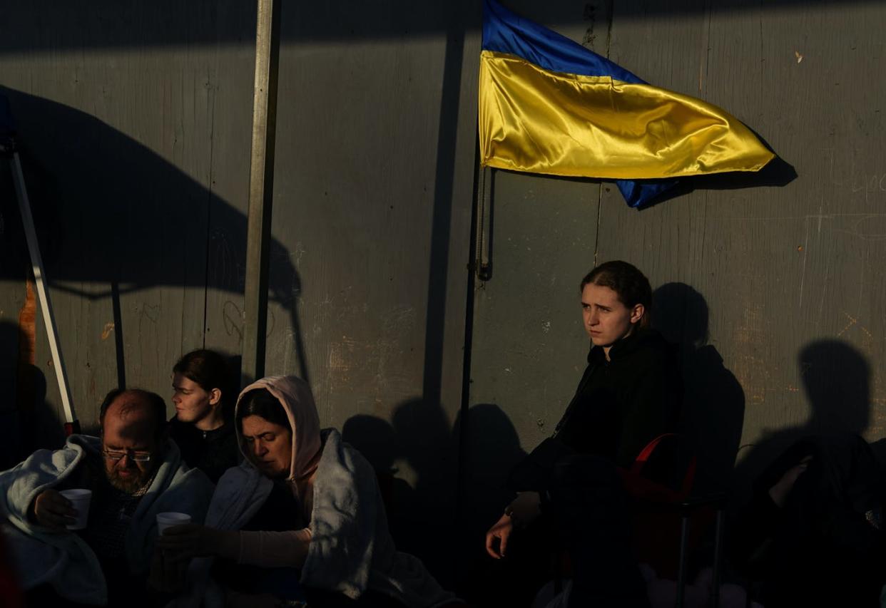 <span class="caption">Ukrainian refugees wait near the U.S. border in Tijuana, Mexico.</span> <span class="attribution"><a class="link " href="https://newsroom.ap.org/detail/APTOPIXUkraineRefugeesUnitedStates/807624ae5e484861b78de8d838d6d54f/photo?Query=refugees%20U.S.%20border&mediaType=photo&sortBy=&dateRange=Anytime&totalCount=1004&currentItemNo=3" rel="nofollow noopener" target="_blank" data-ylk="slk:AP Photo/Gregory Bull;elm:context_link;itc:0;sec:content-canvas">AP Photo/Gregory Bull</a></span>