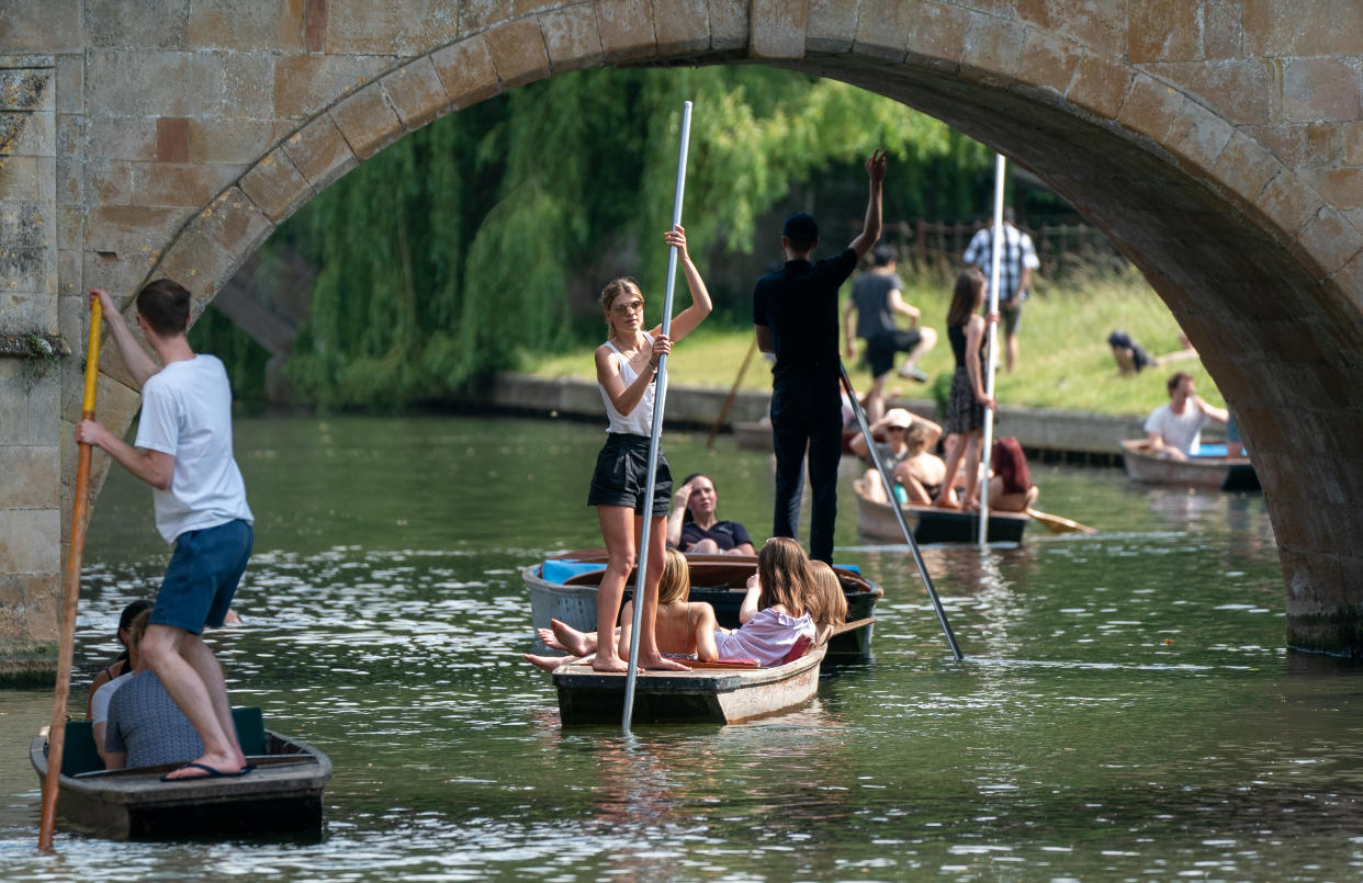 People enjoy punt tours along the River Cam in Cambridge. Wednesday could be the hottest day of the year so far as parts of the UK are set to bask in 30-degree heat. Picture date: Wednesday June 16, 2021.