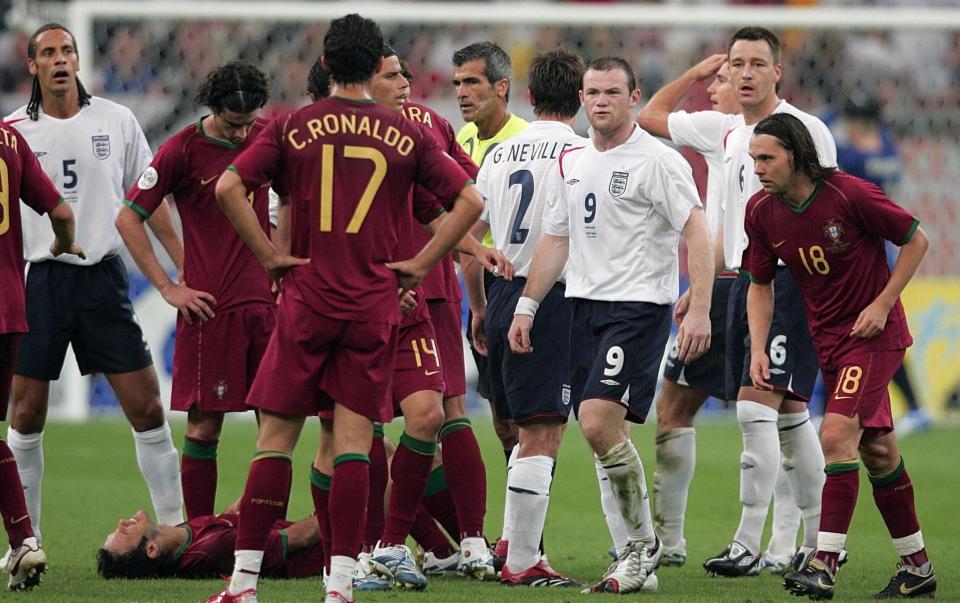 Wayne Rooney glares at Portugal's Cristiano Ronaldo after being sent off. - PA