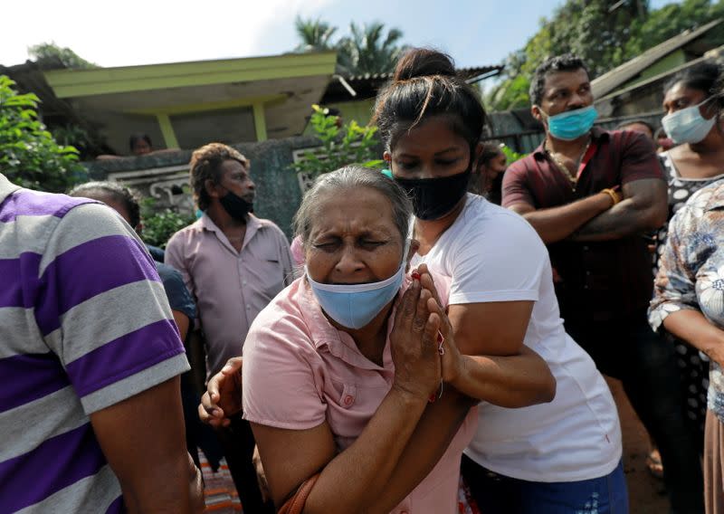 A family member of an inmate reacts outside the prison, following unrest at Mahara Prison, in Colombo