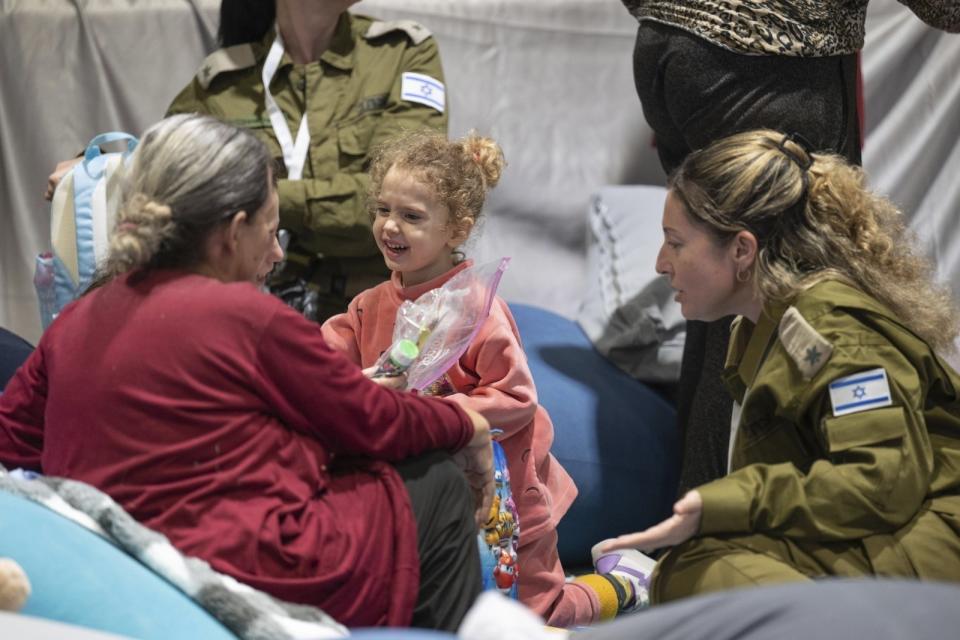 FILE - This handout photo provided by the Israel Prime Minister Office shows Yahel Shoham, 3 years old, upon her arrival in Israel after being freed. Yahel was one of the 13 Israeli hostages that Hamas released late Saturday, Nov. 25, 2023, in the second round of swaps under a cease-fire deal. The phrase "Women and children first" and all it implies about whom to save first in a disaster is rooted in the shipwrecks of centuries past and popularized by Hollywood's treatment of the Titanic disaster is getting another airing at a time when women are expected to do most everything men do. Experts say the unwritten law of the sea is a Hollywood-fed myth and a relic of Victorian-era chivalry. At the center of this round of questions is the prisoners-for-hostages deal between Israel and Hamas last month that prioritized releasing women and children after negotiators agreed that mothers and their children should not be separated. (Israel Prime Minister Office/Handout via AP, File)