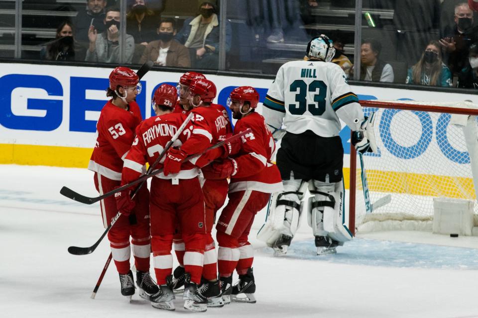 Detroit Red Wings left wing Tyler Bertuzzi (59) celebrates with teammates after scoring a double power play goal against the San Jose Sharks during the second period at SAP Center at San Jose on Jan. 11, 2022.