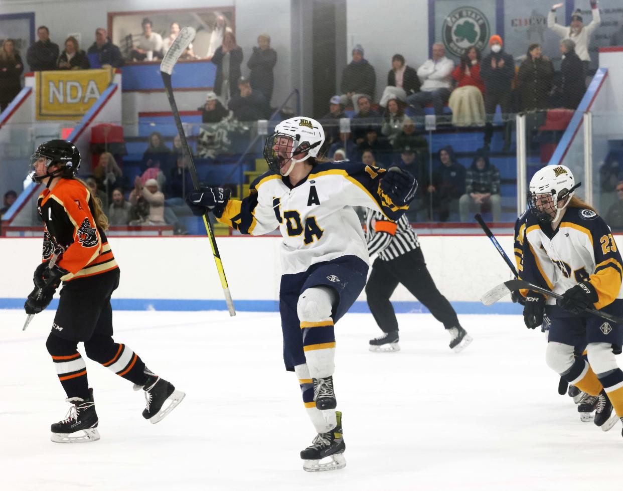 Notre Dame Academy's Maggie Donahue scores a goal during a game versus Berverly/Danvers at the Rockland Ice Rink on Thursday March 03, 2022.  