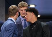 Jun 22, 2017; Brooklyn, NY, USA; Lauri Markkanen (middle) stands behind Lonzo Ball (right) on stage before the first round of the 2017 NBA Draft at Barclays Center. Mandatory Credit: Brad Penner-USA TODAY Sports