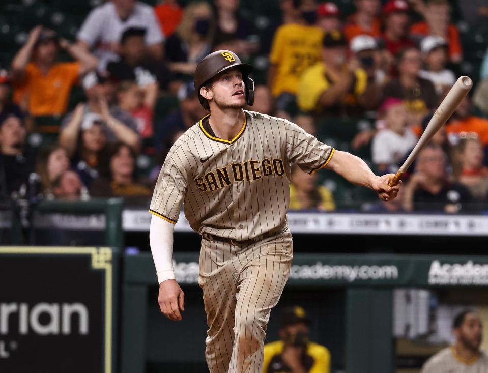 Wil Myers watches his three-run home run clear the fence in the 12th inning of the Padres' 11-8 victory over Houston on Saturday night.