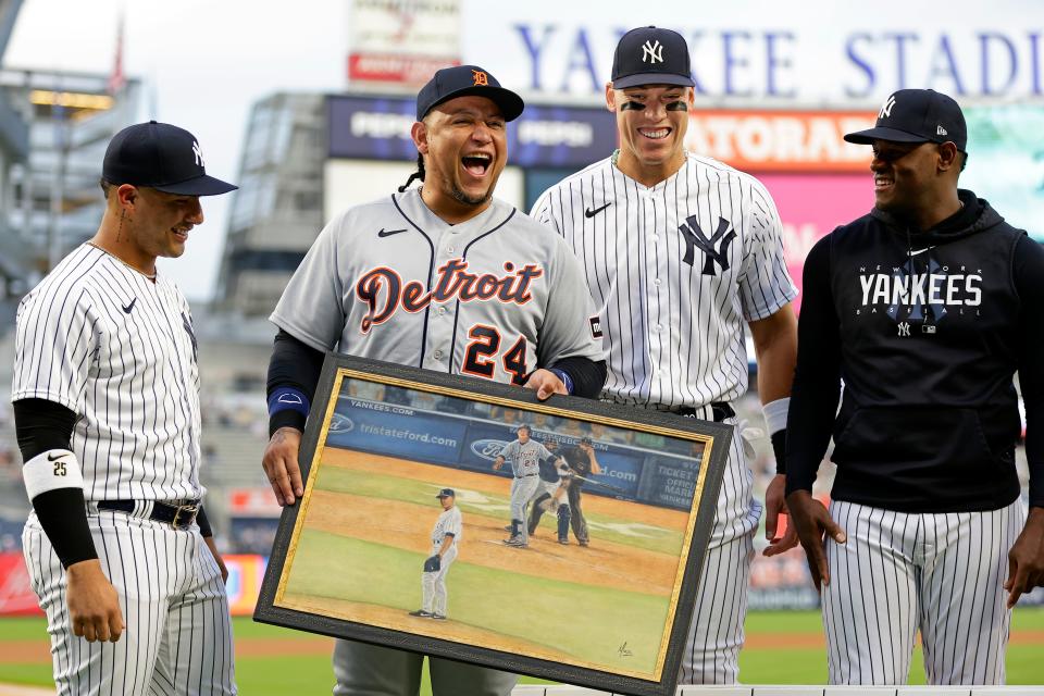 Tigers designated hitter Miguel Cabrera reacts as Yankees second baseman Gleyber Torres, left, right fielder Aaron Judge and pitcher Luis Severino, right, present him gifts during a pre-game ceremony before the game on Tuesday, Sept. 5, 2023, in New York.