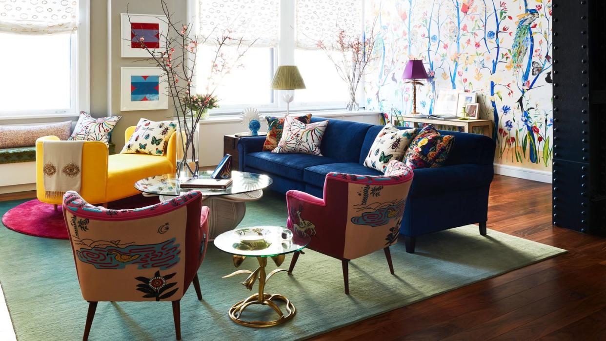 living room manhattan apartment by designer courtney mcleodright meets left interior design armchairs anthropologie side table vintage drexel, 1stdibs rugs custom, makrosha sofa custom, o henry house, in threads meridian velvet, lee jofa roman shades custom