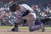 Colorado Rockies' Josh Fuentes reacts after striking out against the San Francisco Giants during the sixth inning of a baseball game in San Francisco, Sunday, April 11, 2021. (AP Photo/Jeff Chiu)