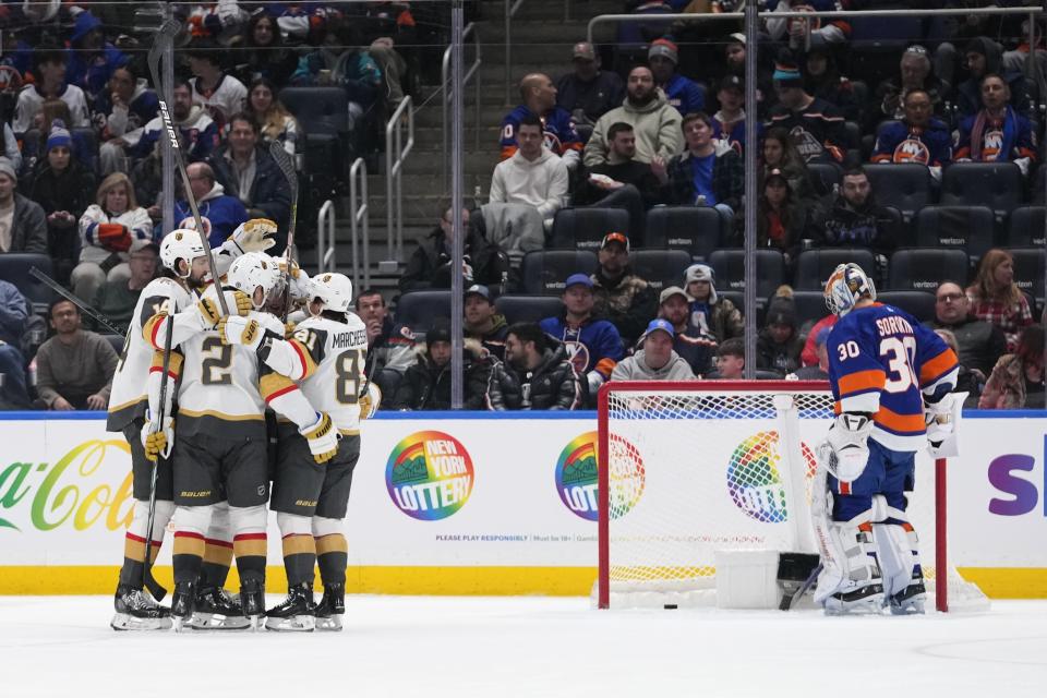 New York Islanders goaltender Ilya Sorokin (30) pauses as the Vegas Golden Knights celebrate a goal by Nicolas Roy during the second period of an NHL hockey game Tuesday, Jan. 23, 2024, in Elmont, N.Y. (AP Photo/Frank Franklin II)